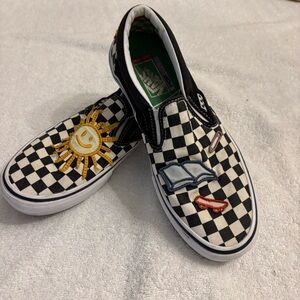 Off the wall Checkered, Black & White Slip-Ons Skater Vans w/ Embroidery.